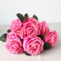 Close-up detail of artificial pink rose bouquet silk flowers for home decoration photography. - Rose Red