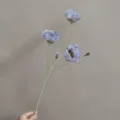 Detailed close-up view of the elegant flocked artificial poppy flower with realistic soft stems. - Purple Gray