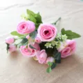 Close up of artificial pink rose and eucalyptus bouquet detail, perfect for home decor. - Pink