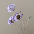 Detailed view of artificial flocked poppy flower, realistic ice poppy faux floral branch for home decor. - Fragrant Purple
