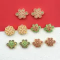 Alloy Chinese knot spacer beads DIY jewelry making accessories detailed close up view - Antique Matte Gold Mix