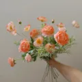 Artificial silk flower bouquet detail view, peach ranunculus and poppy for home decor - Coral Pink