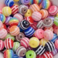 Close-up detail of colorful resin striped round beads for DIY jewelry making and crafts. - 1000 Pieces/Pack (8mm) / Solid Striped Mixed Colors