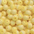 Close-up detail of yellow and white striped resin round beads for DIY jewelry making accessories. - 1000 Pieces/Pack (8mm) / Yellow