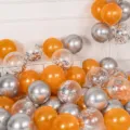Close-up view of assorted latex balloons in champagne gold and silver for party decor. - Pearlescent Champagne Gold/Metallic Silver/Sequin Silver Set
