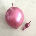 Metallic tail balloon for birthday wedding party decoration, glossy latex balloon detail view. - 10 Inch 100 Pcs Pack / Red