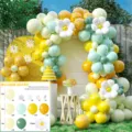 Detail shot of party balloon arch kit featuring green, yellow and white daisy foil balloons. - Cross Border Balloon Set 04