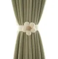 Close-up detail of the minimalist fabric flower curtain tieback, showing texture and design. - Single Flower Style / Off White
