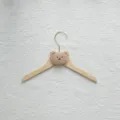 Wooden clothes hanger with cute plush bear head design for kids room wardrobe storage. - Khaki Bear / Khaki