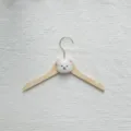Wooden baby clothes hanger with cute embroidered bear head, ideal for kids clothing organization. - White Bear Head / White