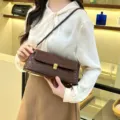 Chic brown crocodile pattern baguette shoulder bag, detailed clasp and stylish underarm design. - Stone Pattern Coffee