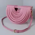 Pink semicircular shoulder bag for women, stylish niche design handbag with unique pleated details. - Pink