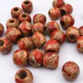 Vue detaillee de perles en bois de 11x12mm a grand trou avec motif floral retro pour tresses. - 11x12mm (Ouverture d'environ 5mm) / Phénix Rouge