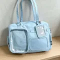 Détail de sac ita bleu clair, fenêtre transparente pour l'affichage de goodies. - Bleu