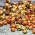 Close-up detail of mixed color retro wooden beads with tribal geometric patterns for DIY jewelry. - 11x12mm (Aperture about 5mm) / Multicolor