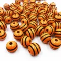 Perles en bois 16mm rayées orange et noir perles rondes en vrac pour fabrication de bijoux faits main - Fond Orange avec Rayures Noires