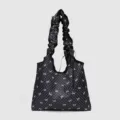 Sac à bandoulière en toile à pois noirs avec bretelles à volants pour un usage quotidien. - Sac à Main Noir