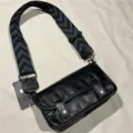 Black vintage crossbody bag for women and men, featuring a wide patterned strap and flap design. - Size 42 Black