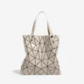 Sac cabas géométrique pour femme, variante élégante de sac à épaule beige tendance chic. - Abricot
