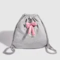 Sac à dos cordon gris avec joli pendentif nœud rose, sac casual léger pour étudiante. - Gris