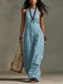 Detailed view of a light blue sleeveless linen-blend jumpsuit with a chic halter neck. - S / Light Blue