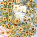 Sunflower sticker pack detail showing transparent PET waterproof decorative botanical journaling supplies. - Warm Sunflower