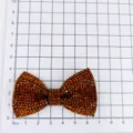 Detailed size view of sparkling brown rhinestone bow accessory, perfect for shoes and hair crafts. - Brown (2)