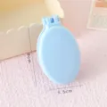Spazzola per capelli mini pieghevole portatile con specchio, spazzola da viaggio azzurra. - confezione individuale / Blu