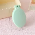 Mini spazzola per capelli pieghevole portatile con specchio, pettine da viaggio tascabile verde. - confezione individuale / Verde