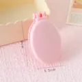 Spazzola per capelli da viaggio pieghevole rosa con specchio, formato tascabile 9x5,5cm. - Rosa