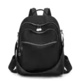Black casual backpack for women, large capacity nylon travel school bag with multiple zippers. - Black