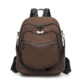 Stylish brown women's backpack, casual multi-pocket design, lightweight daily commute travel bag. - Dark Brown