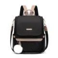 Black nylon quilted women backpack with contrast khaki straps and cute fluffy ball pendant. - Black