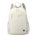 Lightweight nylon backpack for women, casual daily travel school bag with multi pockets. - White