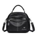 Black faux leather women handbag casual multi-zipper shoulder bag with top handle and strap. - Black