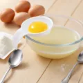Kitchen egg white separator tool with bowl clip, white silicone egg yolk separator for baking. - White
