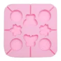 Pink square silicone mold with lollipop, butterfly, and flower cavity designs for baking. - YH777