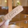 Fashion leather hair clip with love embossed design, chic candy color minimalist hair accessory for women. - Flesh Pink