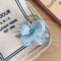 Light blue organza flower hair claw clip with crystal heart and pearl fringe for women and girls. - Blue