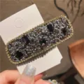Rhinestone hairpin detail view showcasing sparkling crystals and elegant daily hair styling. - Square / Purple