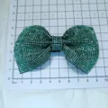 Detailed view of green rhinestone bow patch, sparkling diamond DIY shoe and hair accessory. - Style 5 - Green Rhinestone Bow