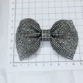 Detail shot of sparkling rhinestone bow shoe clip, stunning crystal accessory for DIY fashion. - Style 8 - Pave Diamond Bow Accessory