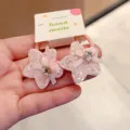 Pink glitter star hair ties with cute bows and rhinestones for little girls and children daily. - Star Hair Tie