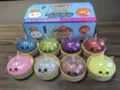 Regenbogen Antistress Mochi Bun Spielset mit süßen Dämpfern und glitzerndem Design. - Einhorn Brötchen Stern Glitzer Gel Blind Box / 1 Stück