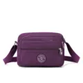 Stylish purple nylon crossbody shoulder bag for women with multi pockets and daily casual use. - Purple