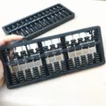 Black 13-rod soroban abacus for kids math learning, plastic arithmetic calculating tool. - Black