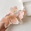 Large lily flower hair claw clip, elegant 3D floral hair accessory for women and girls. - Lily Flower Claw Clip / Champagne