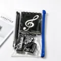 Set de papeleria de tema musical con cuaderno lapiz y borrador en una bolsa de PVC - Nota Musical Negra