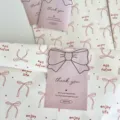 Detailed view of aesthetic kraft paper gift bags with cute bow prints and thank you cards for gifts. - Bow Stickers / 1 Sheet