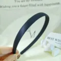 Classic black satin hair hoop for women, elegant daily hairband for face washing and styling. - Solid Black